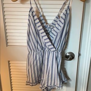 Blue and white stripped ruffled romper